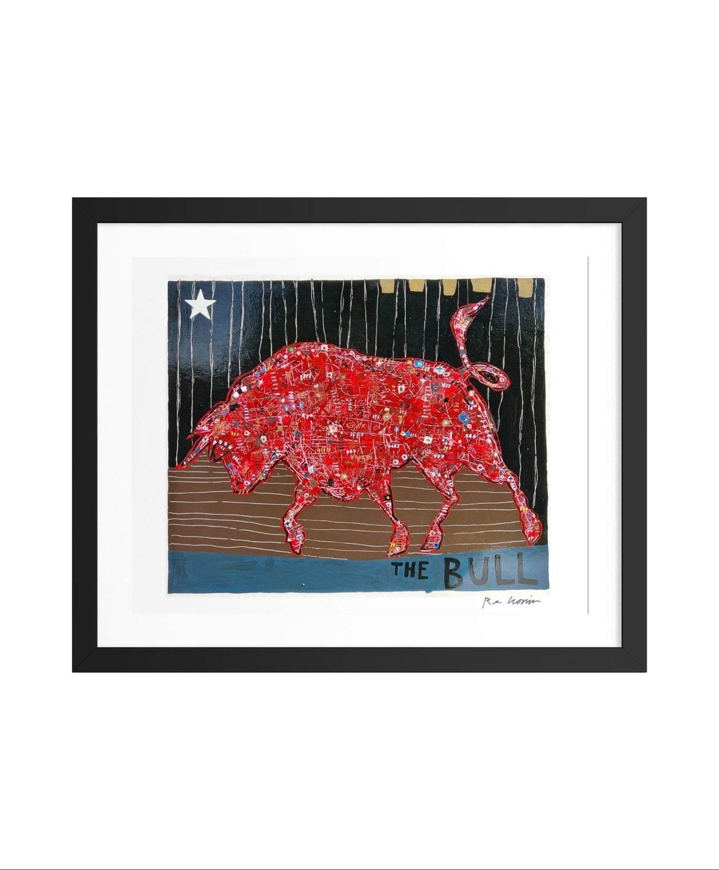 Framed artwork of a red bull with a star on a blue background
