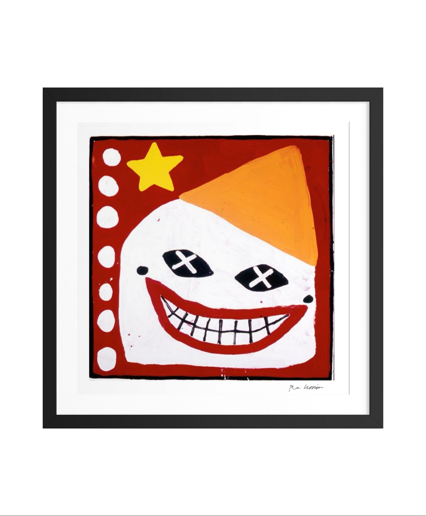 Framed artwork of a stylized clown face with a star on a red background