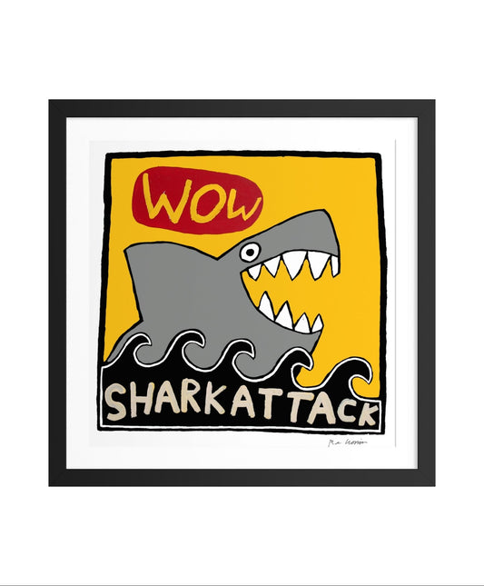 Framed artwork with a shark illustration and text 'SHARK ATTACK' and WOW" on a yellow background.