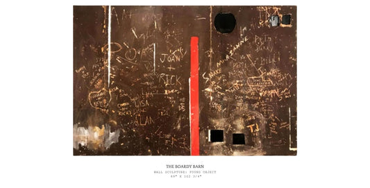 Metallic surface with text and a red line, resembling a board with writing. Wall sculpture made from found object.